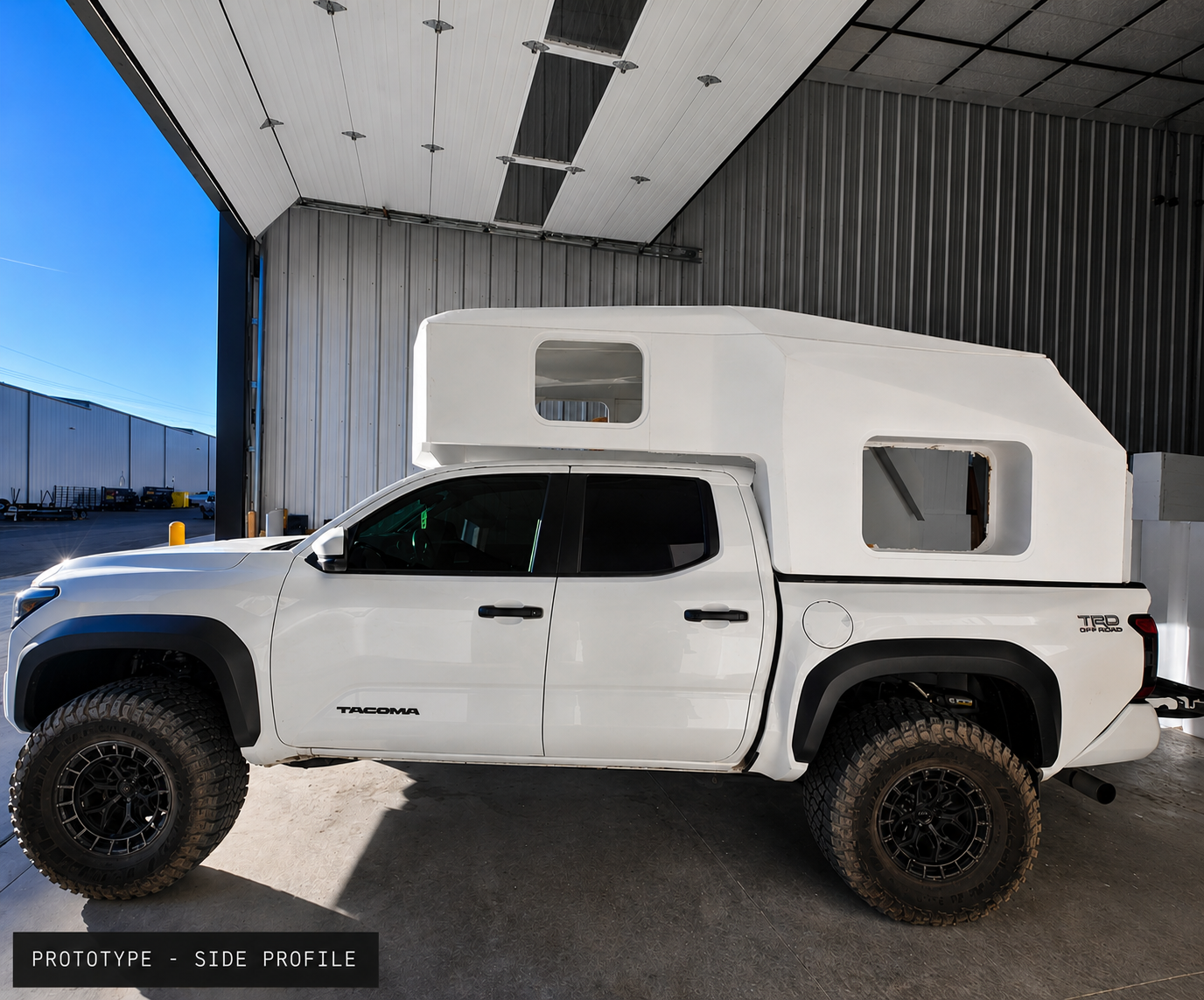 The first TacoHut shell mounted on a Tacoma in the shop